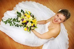 Beautiful Toronto Wedding Photography - Bride sitting on floor with bouquet